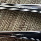 14 fish cutlery sets, 6 forks, 6 knives, 2 stainless steel serving cutlery sets