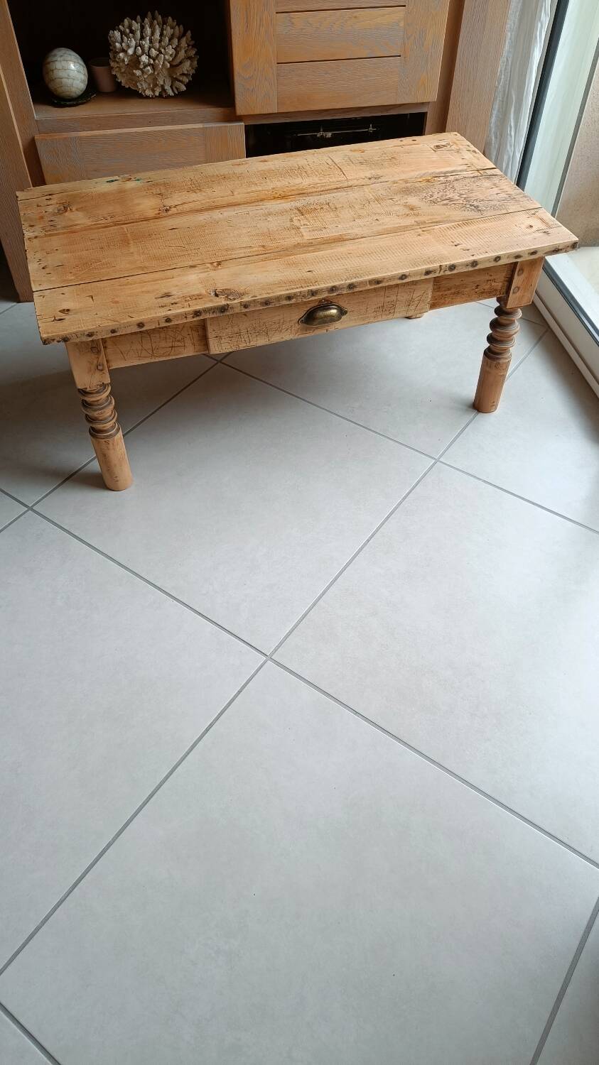 Raw wood coffee table in a country style