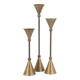 Trio of brass candlesticks by Christian de Beaumont
