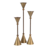 Trio of brass candle holders by Christian de Beaumont