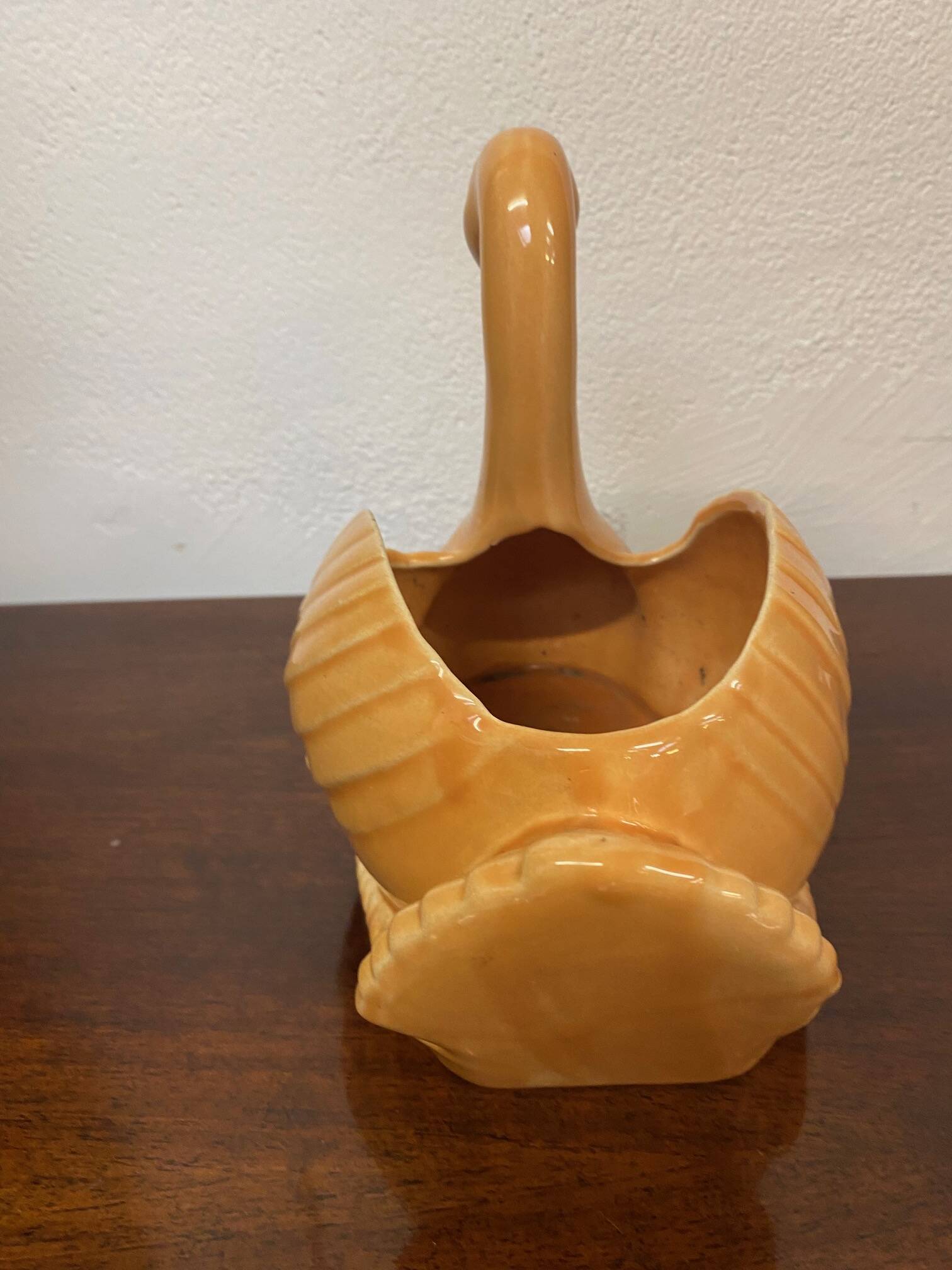 Swan shaped planter in 70s earthenware apricot orange color
