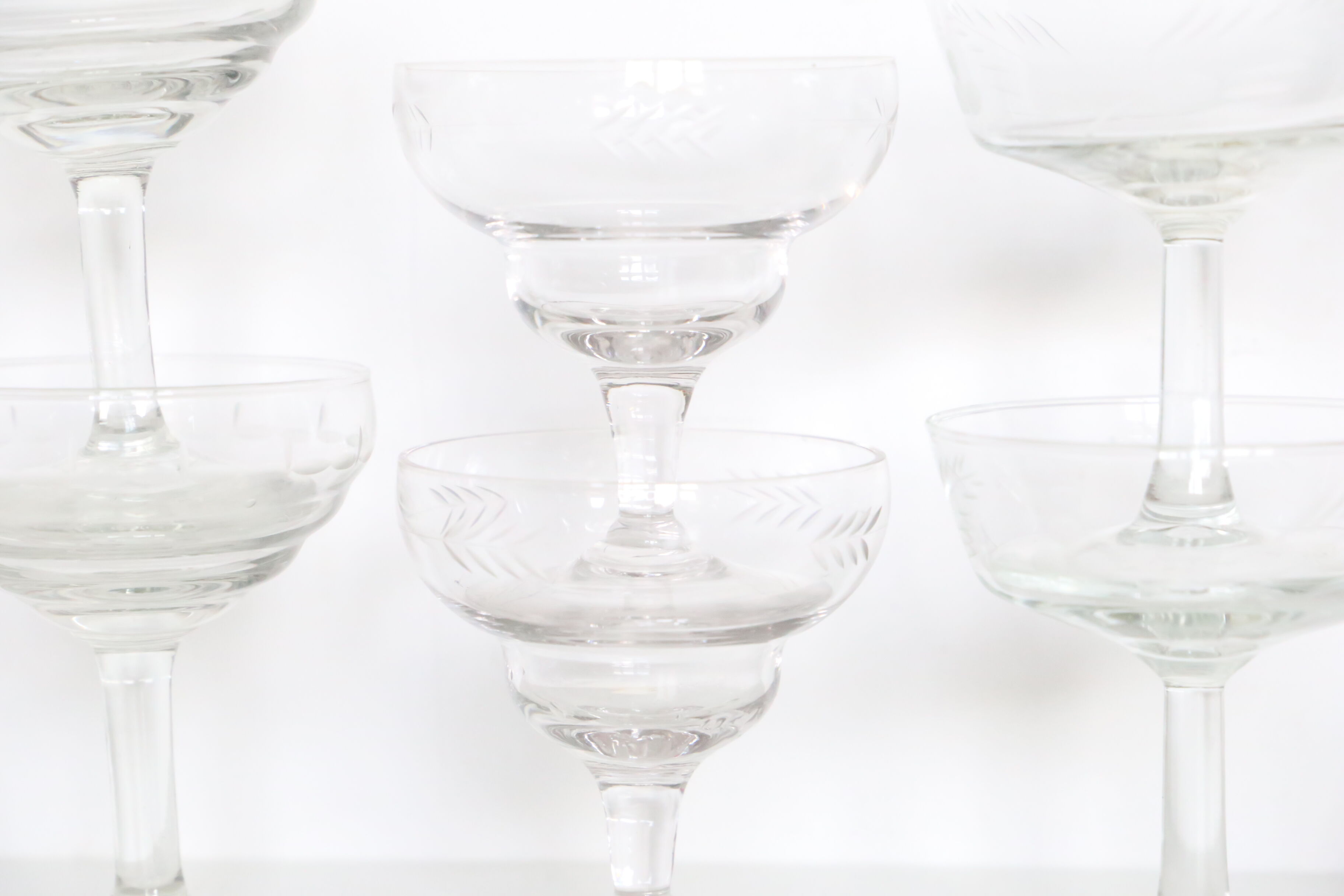 Set of 6 mismatched champagne glasses, chiseled glass