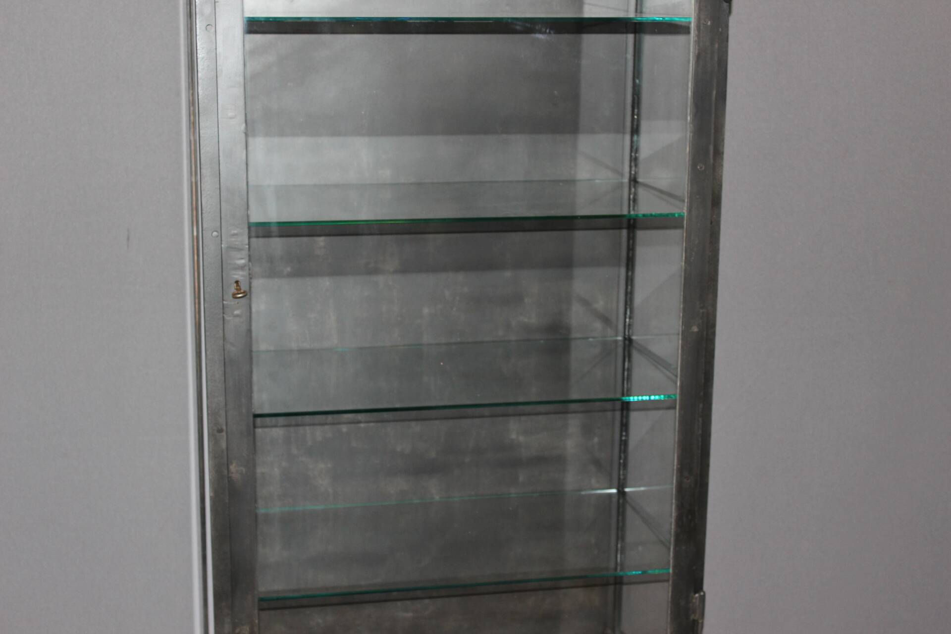 Iron display cabinet with black patina from around 1920