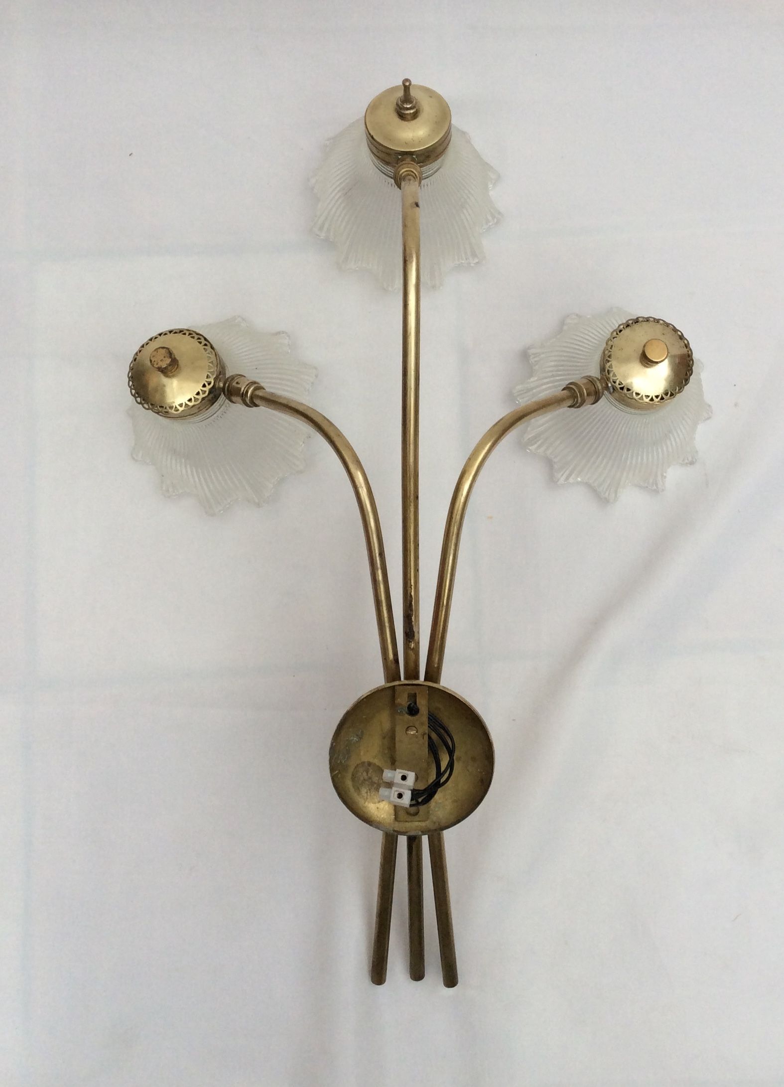 Bronze sconce with three glass tulips