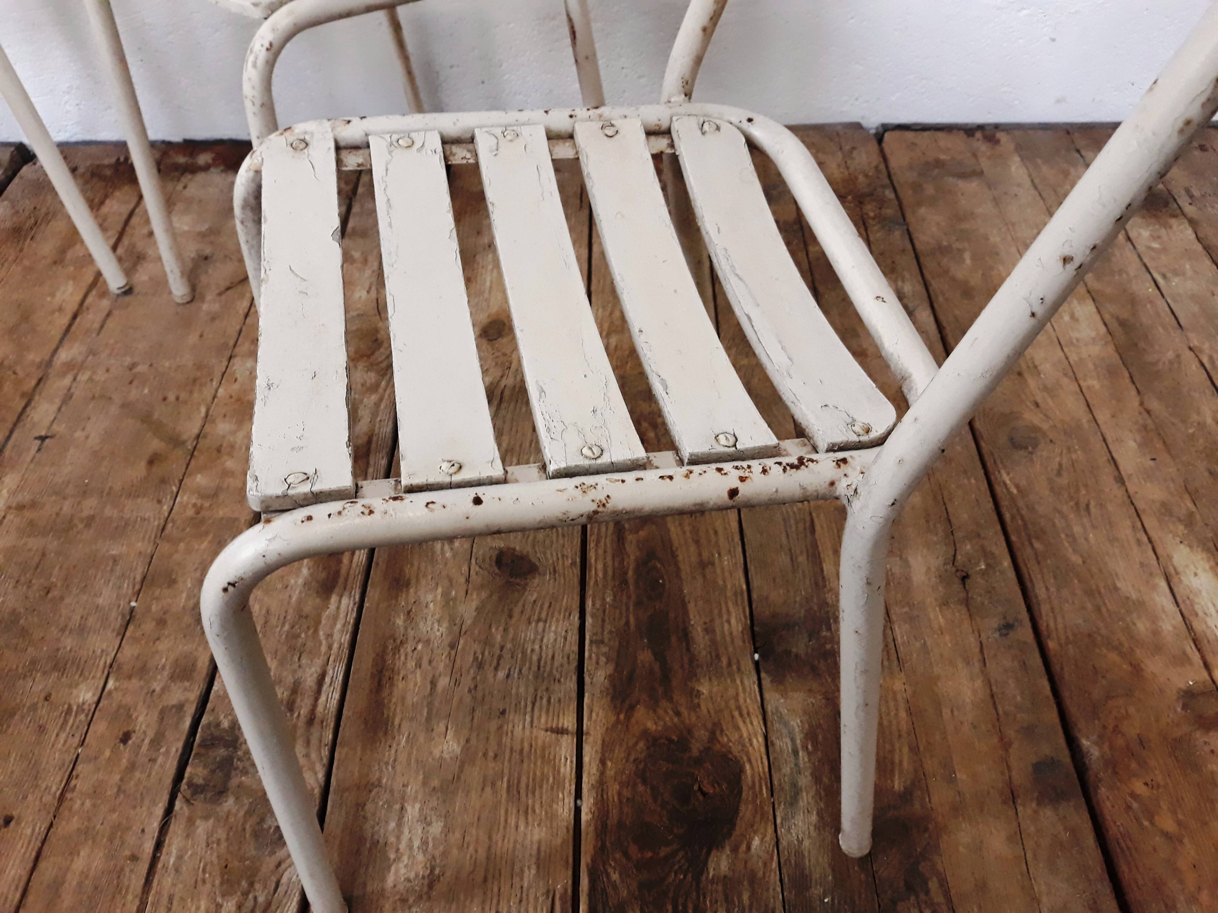 4 chairs and armchairs by Tolix