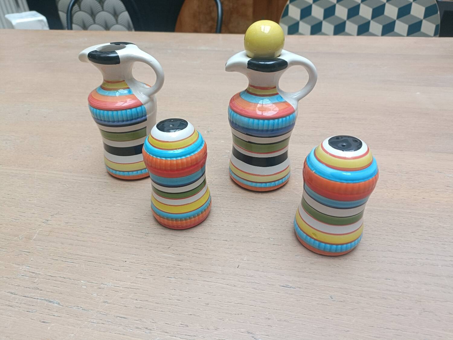 Vinegar and oil set, salt shaker and pepper shaker.
