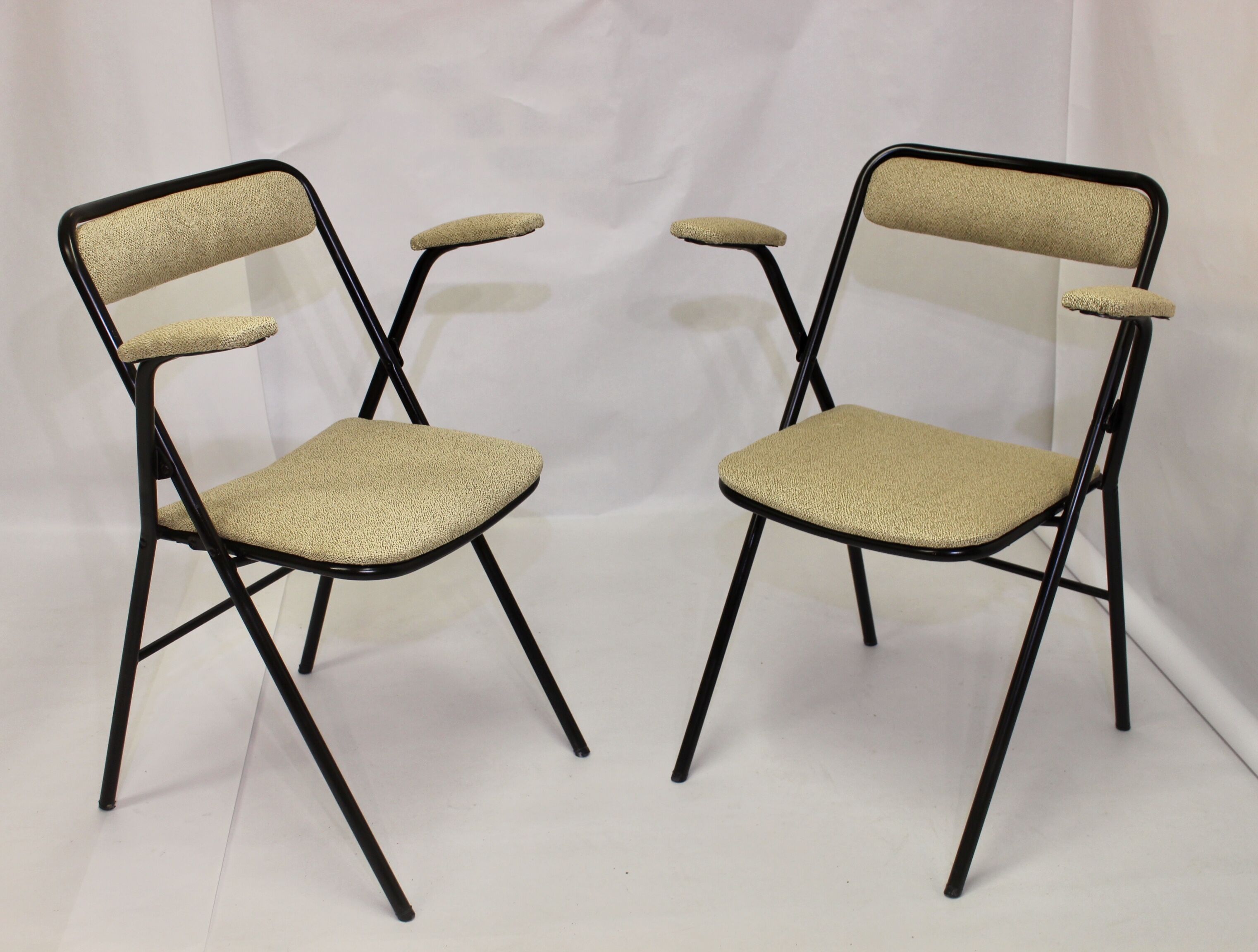Pair of folding chairs with vintage armrests, 70s