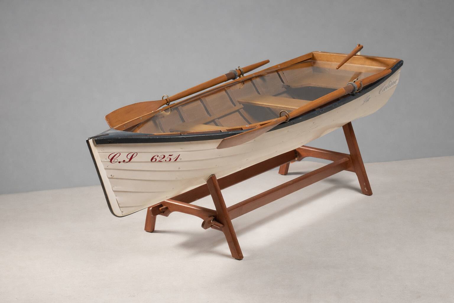 Boat-shaped coffee table reimagined with a glass top, contemporary design (after 2000)