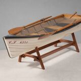 Boat-shaped coffee table reimagined with a glass top, contemporary design (after 2000)