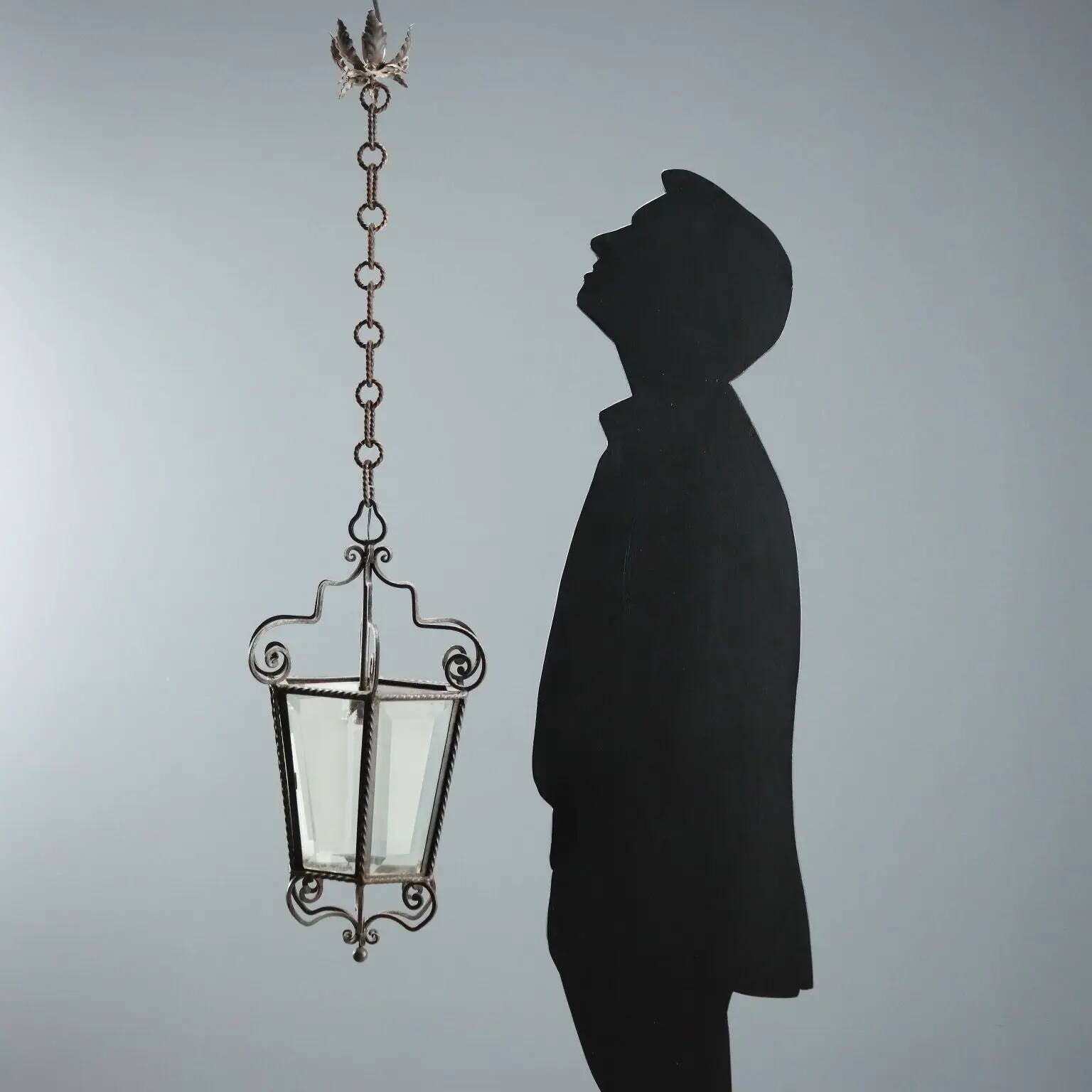 Old iron and glass lanterns, Italy, early 20th century.