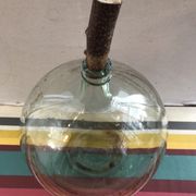 Former green glass demijohn