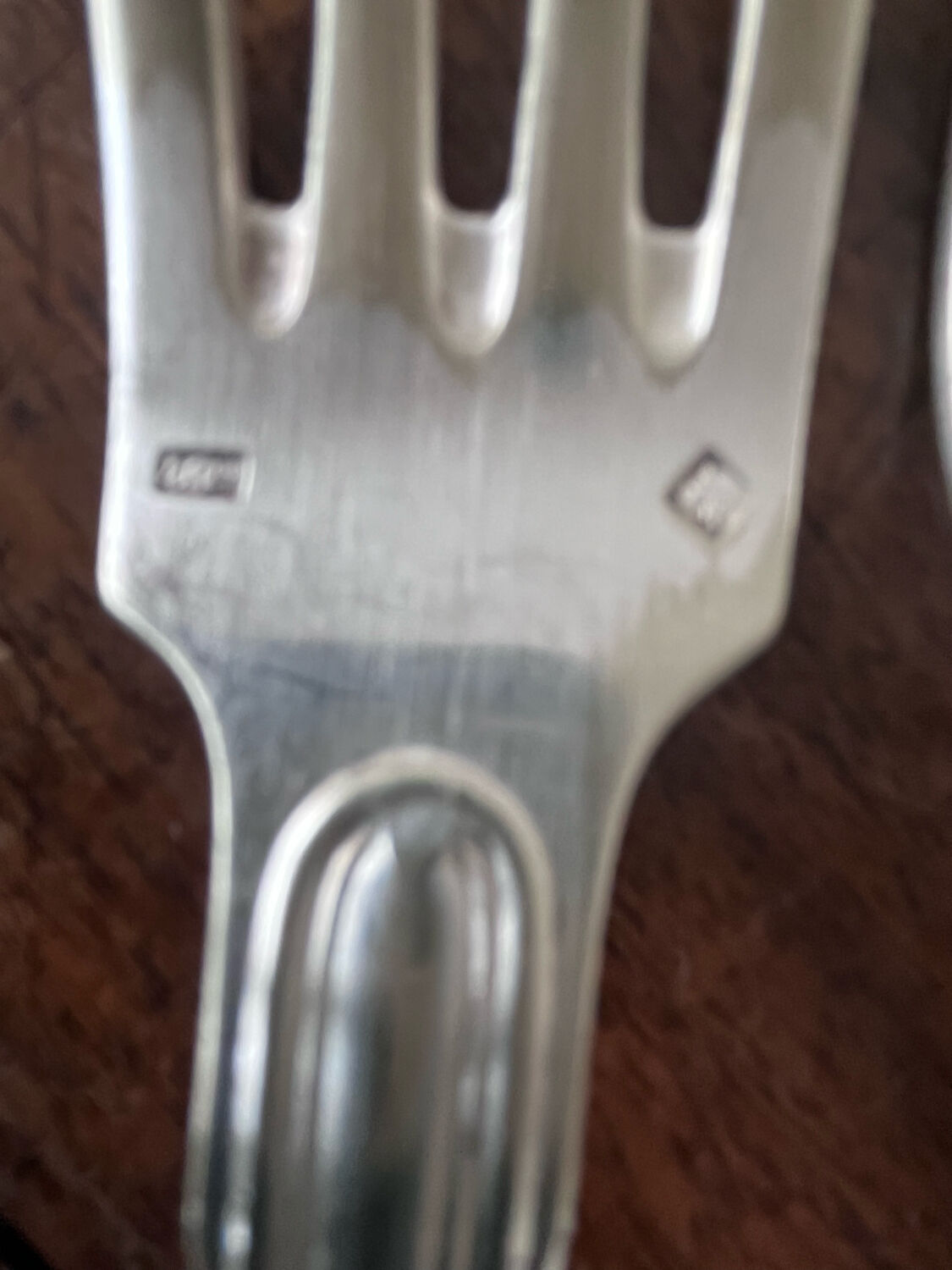 4 silver metal forks