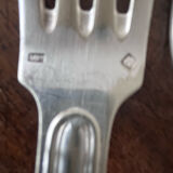 4 silver metal forks