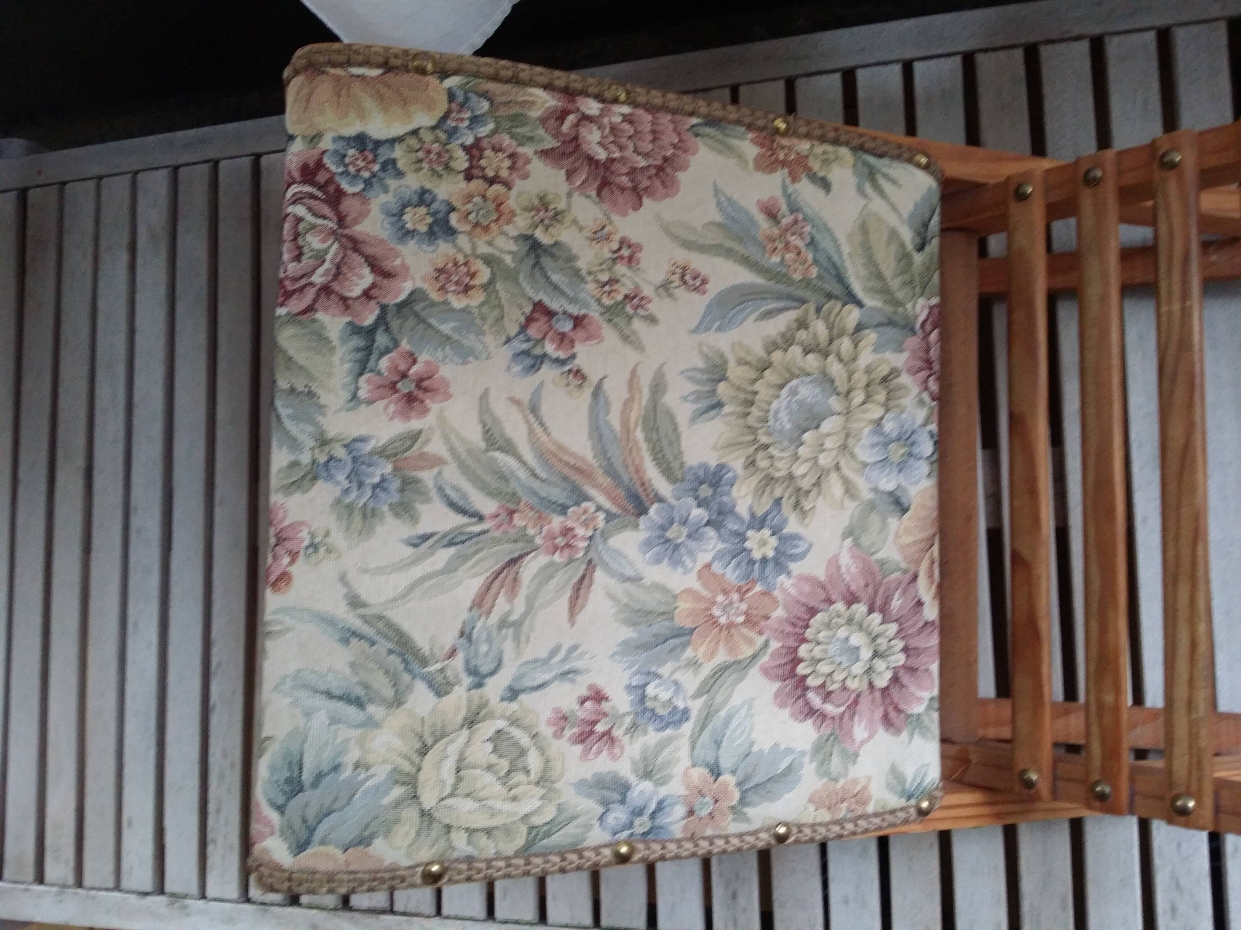 Wooden footrest and vintage tapestry