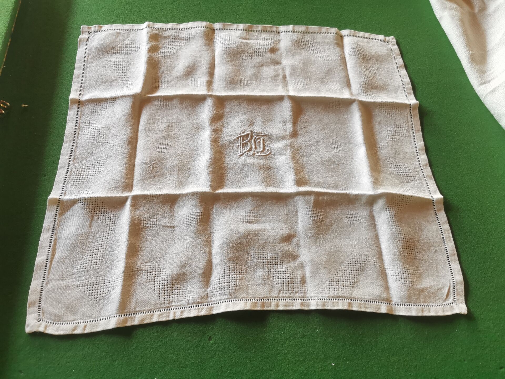 Set of 16 table napkins and an old floral damask tablecloth.