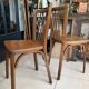 Pair of vintage Baumann bistro chairs in wood.