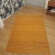 Tapis ethnique en fibres naturelles teint