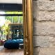 Antique mirror, 238.5/51cm, between two panes, with gilded pediments and gold leaf
