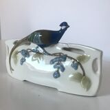 Letter door in earthenware topped with a peacock