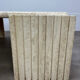 Table basse travertin forme œil par Roche Bobois