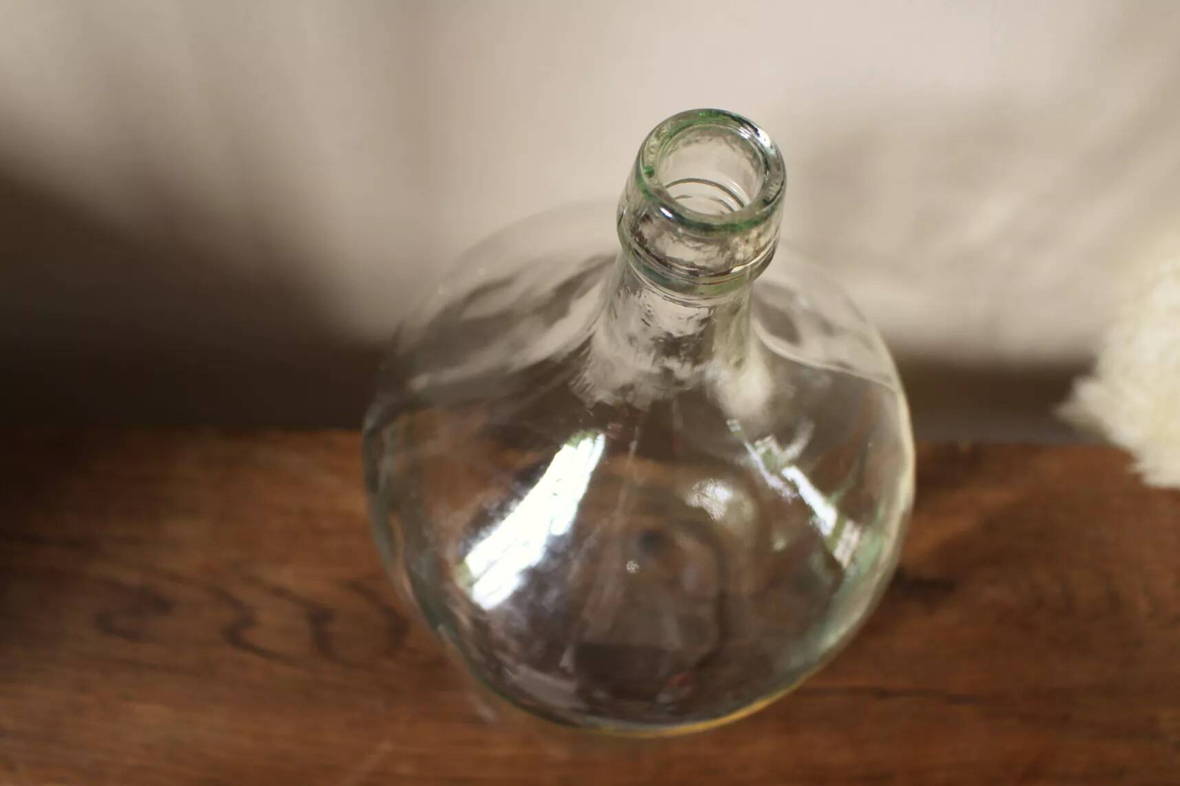 Clear glass demijohn carboy