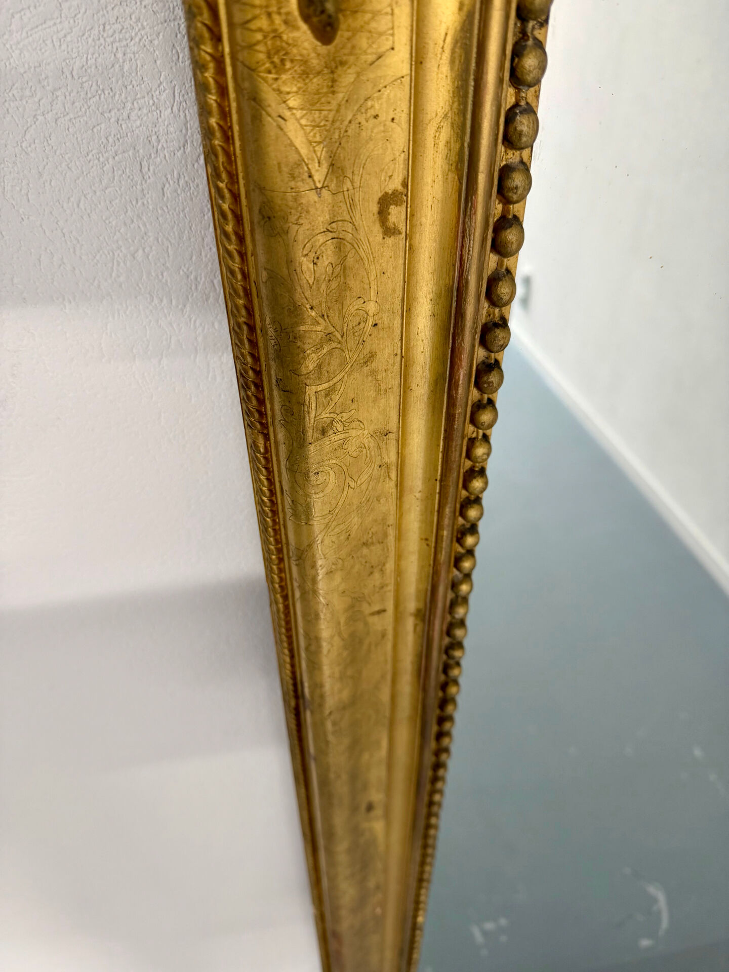 Large Napoleon III mirror with wooden gilded frame, 19th century, 200 cm.