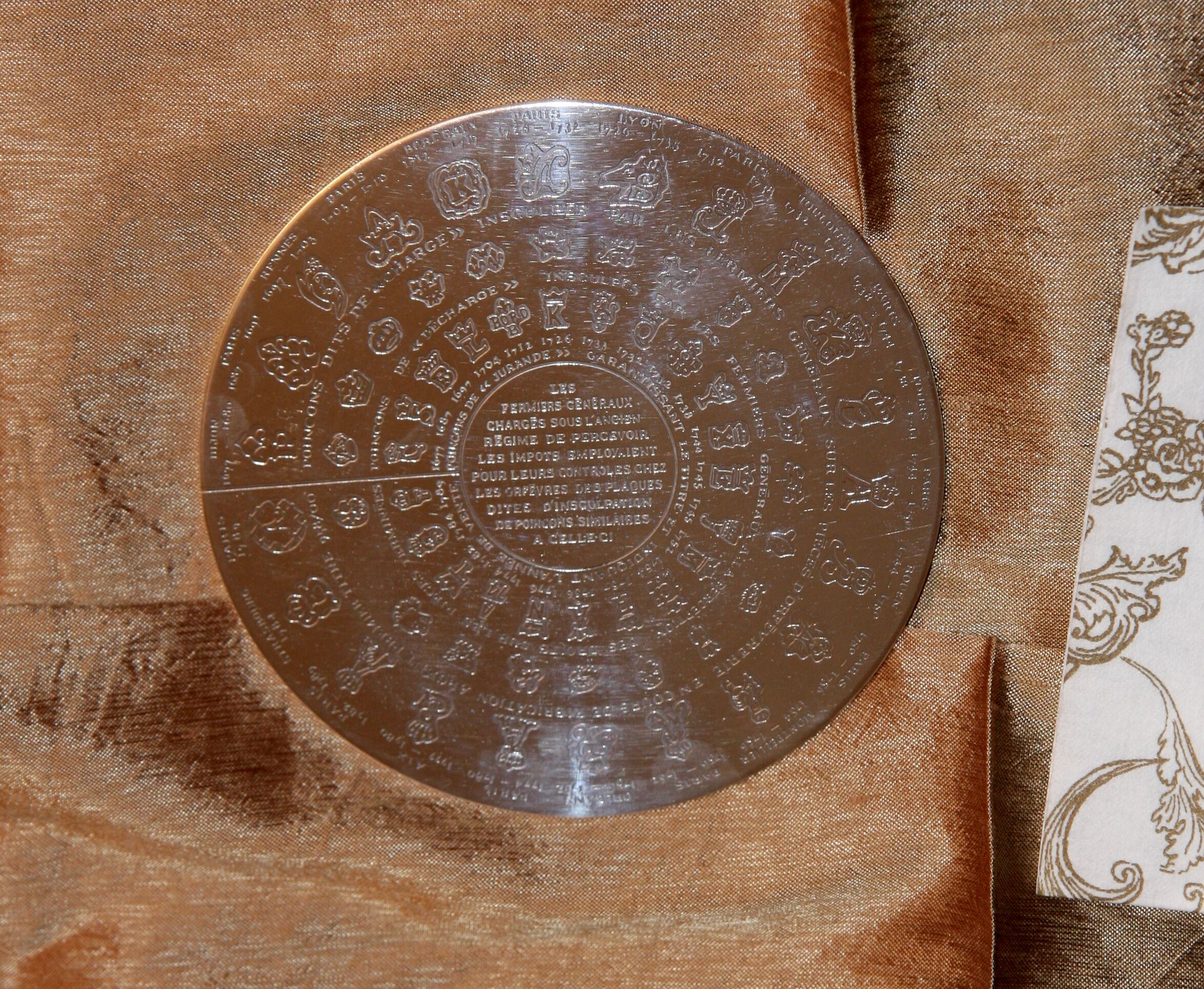 Dessous de plat Christofle " Fermiers Généraux " en métal argenté.
