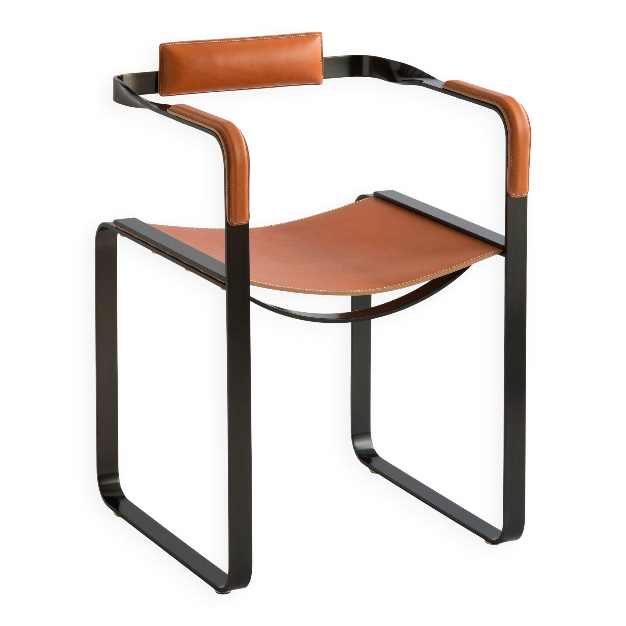 Armchair, smoked black steel and natural tobacco saddle leather Contemporary design