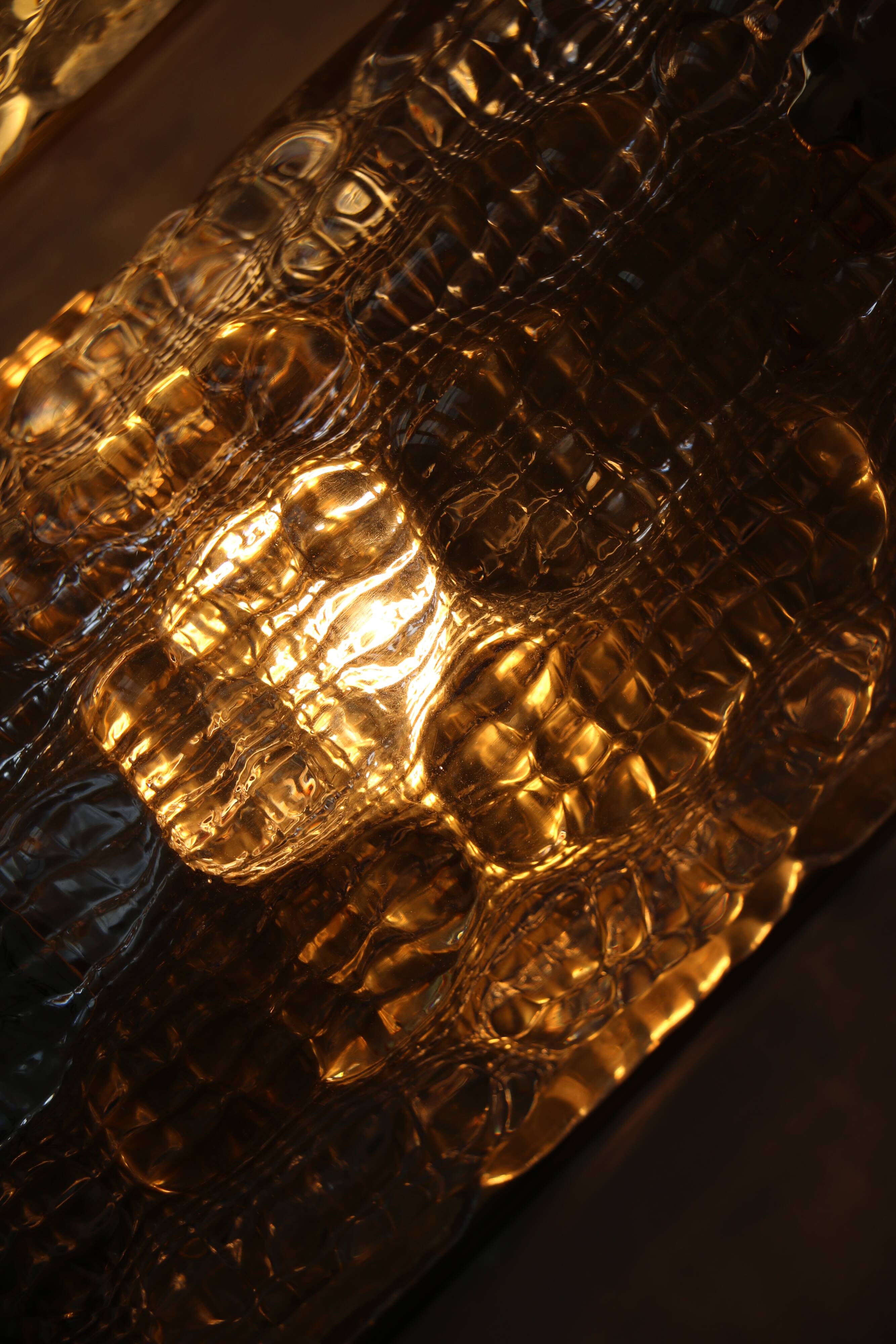 Pair of glass and brass wall lights by Carl Fagerlund for Orrefors.