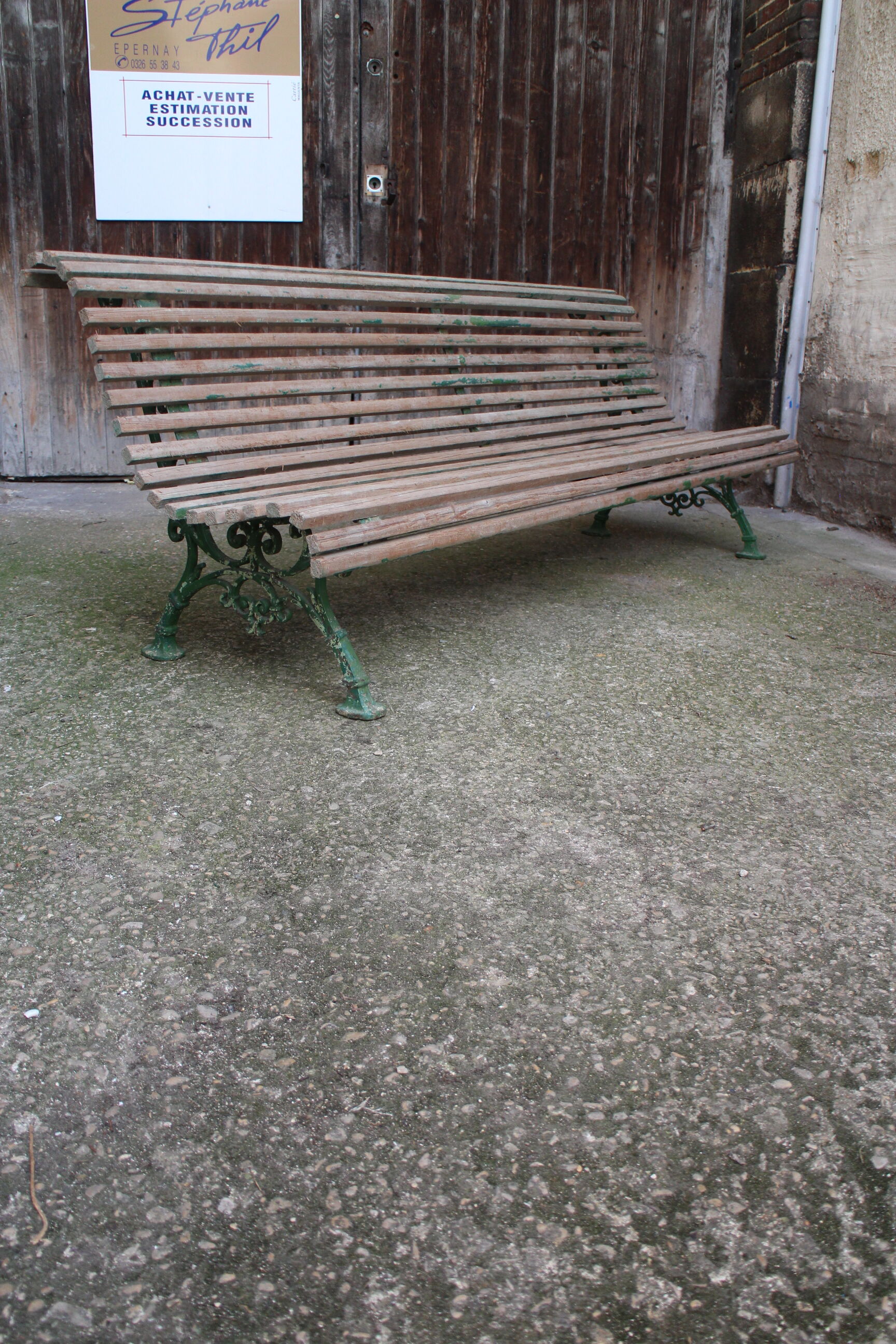 Old bench cast iron base and wooden slats