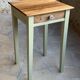 Restored antique oak bedside table - almond green and natural varnished wood