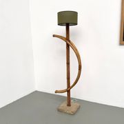 Sculptural floor lamp in bent rattan