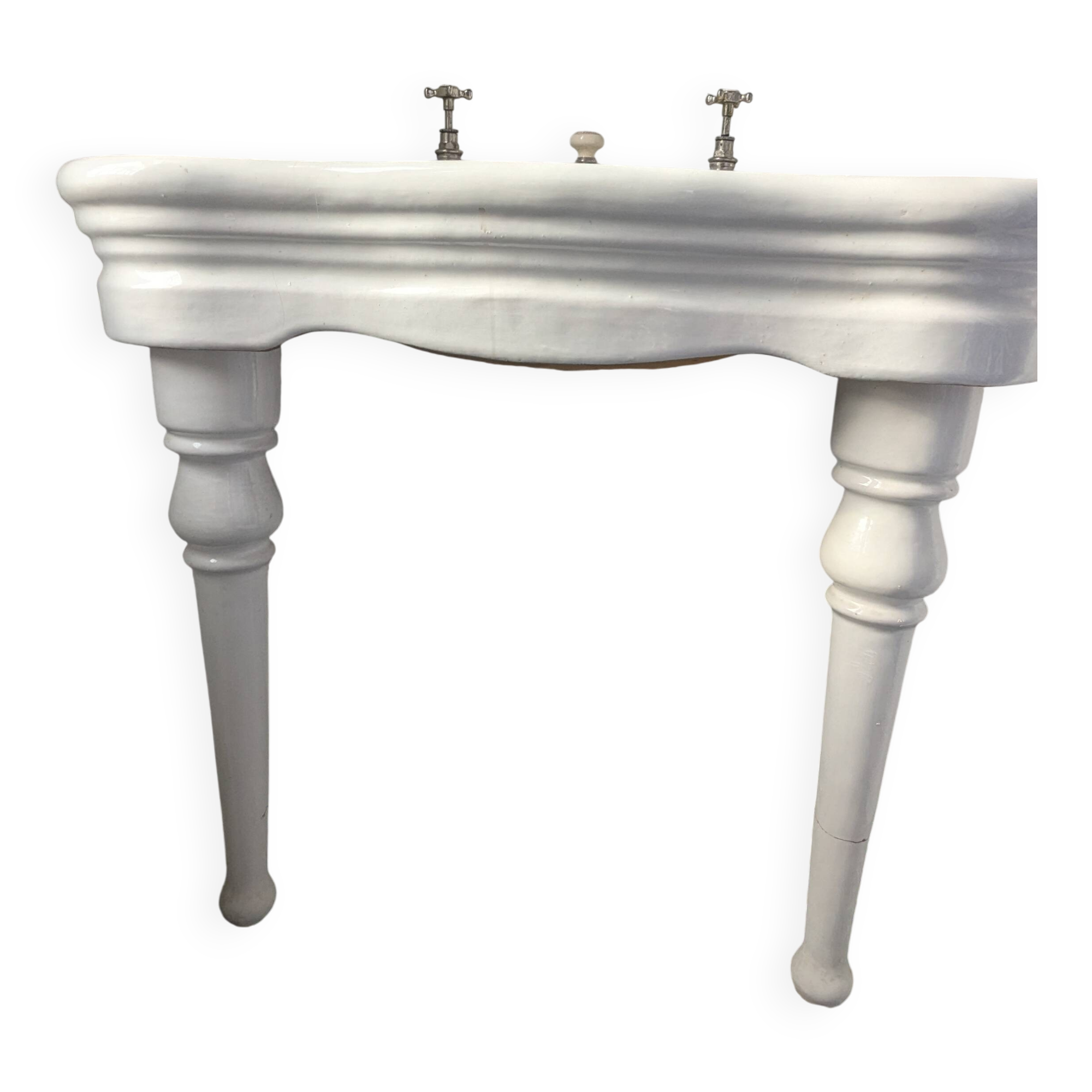 Set of a sink and its retro ceramic splashback.