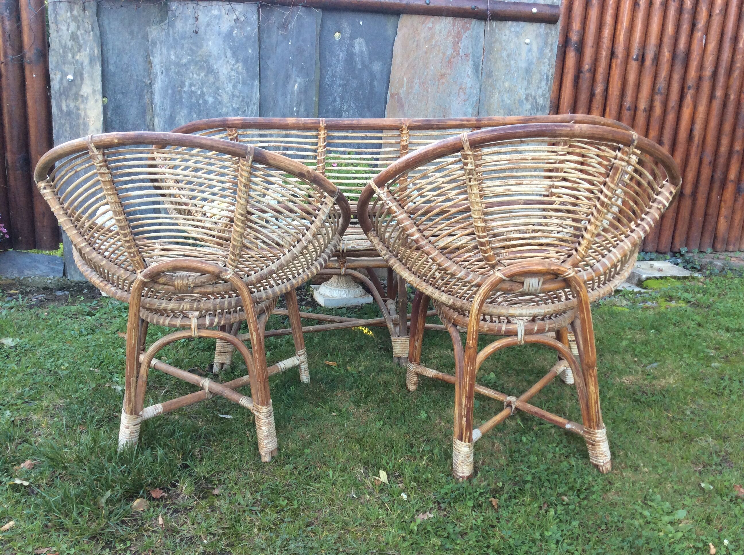 Set of 4 armchairs and 1 vintage rattan bench (5 pieces) inseparable.