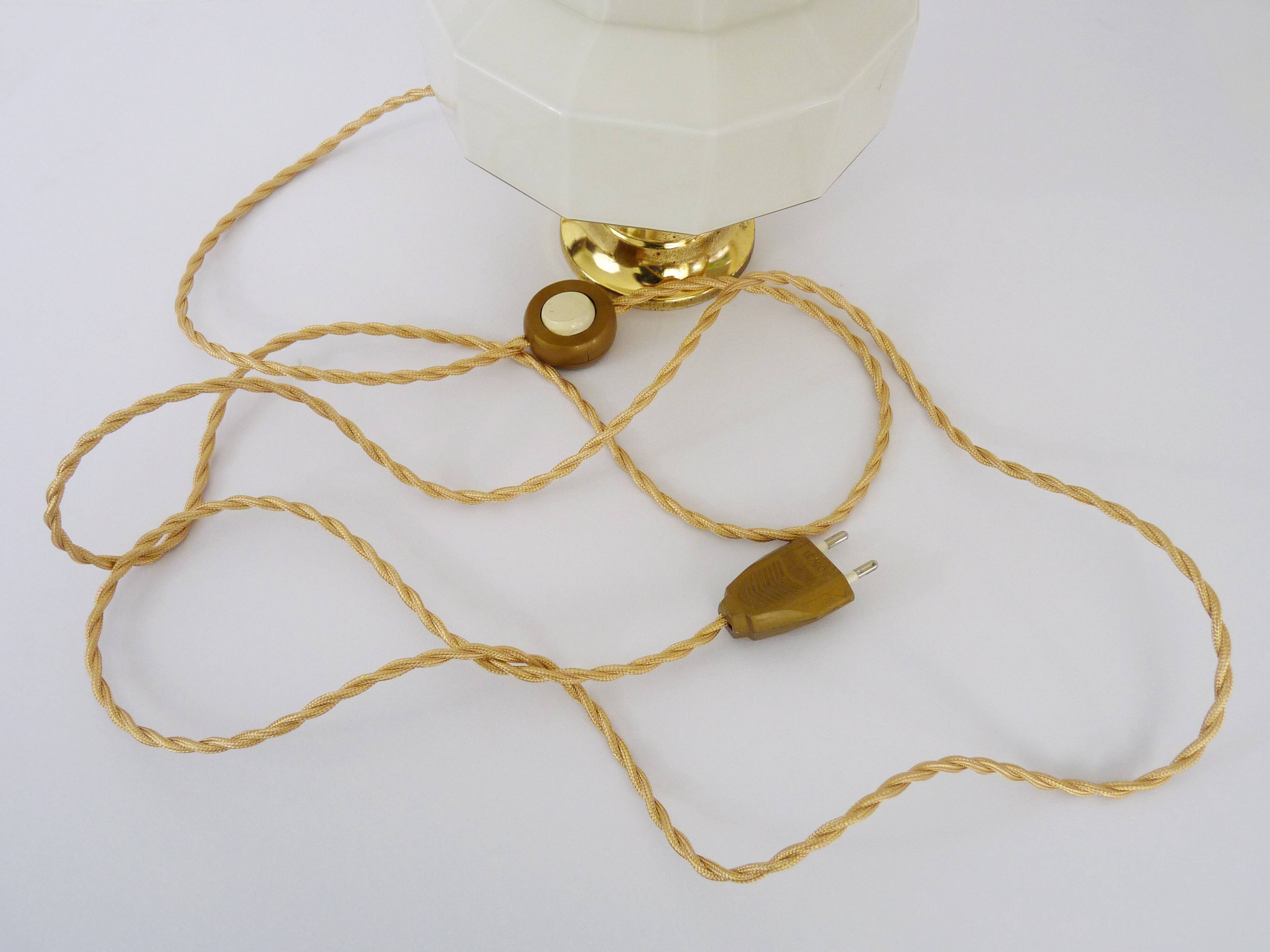 Skyscraper lamp in opaline and brass foot. Globe Art Deco