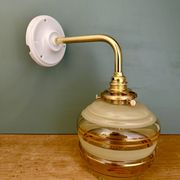 Applique coudée globe vintage en verre jaune et doré