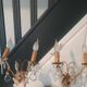 Pair of golden wall lights with vintage glass tassels