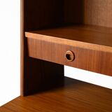 Bookcase with drawers and storage compartment