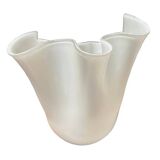 White glass vase in corolla shape