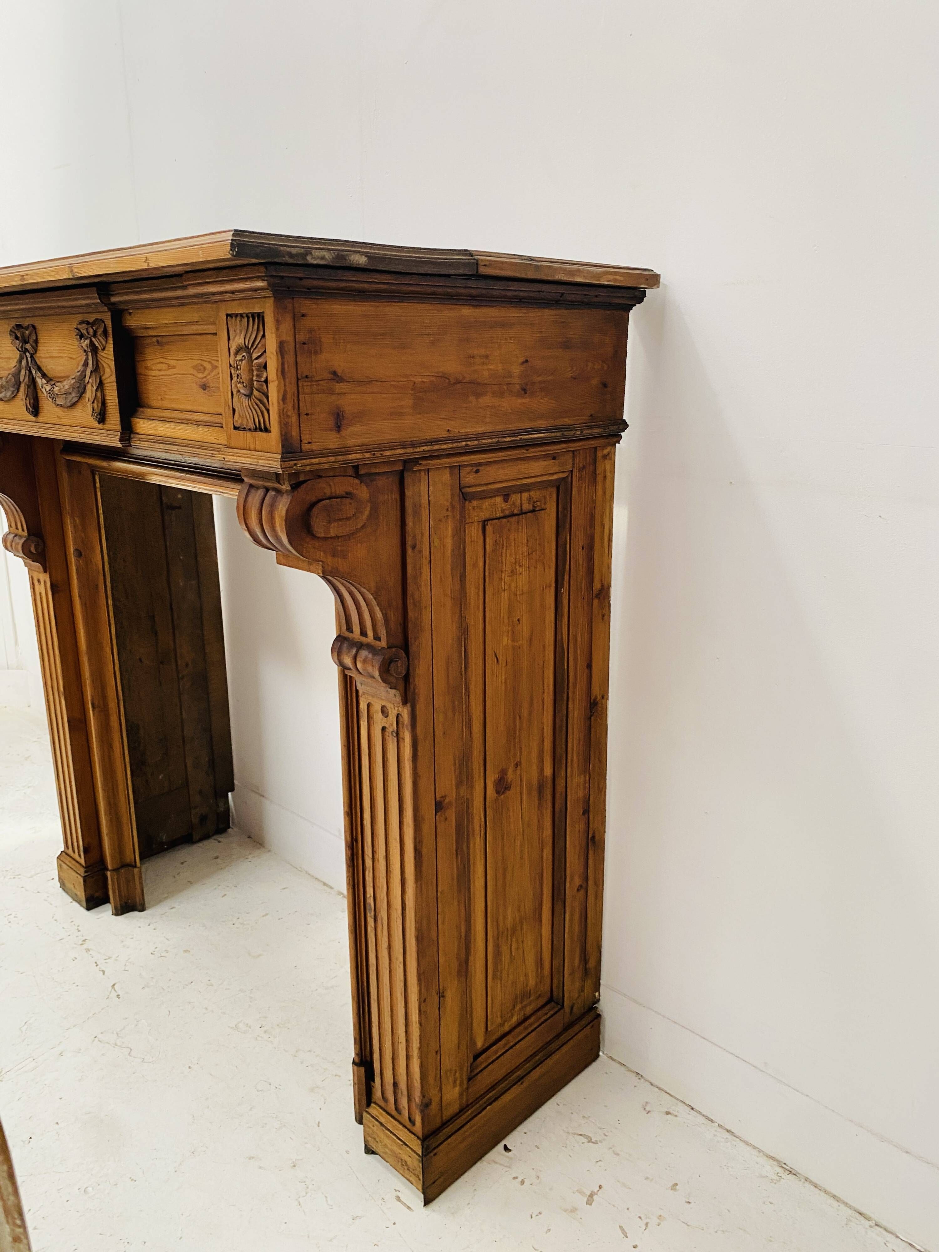 Louis XVI style fireplace in solid fir, 19th century.