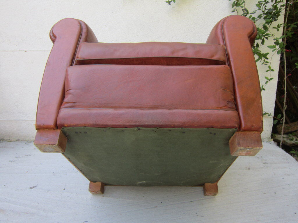 Paire de fauteuils club en cuir