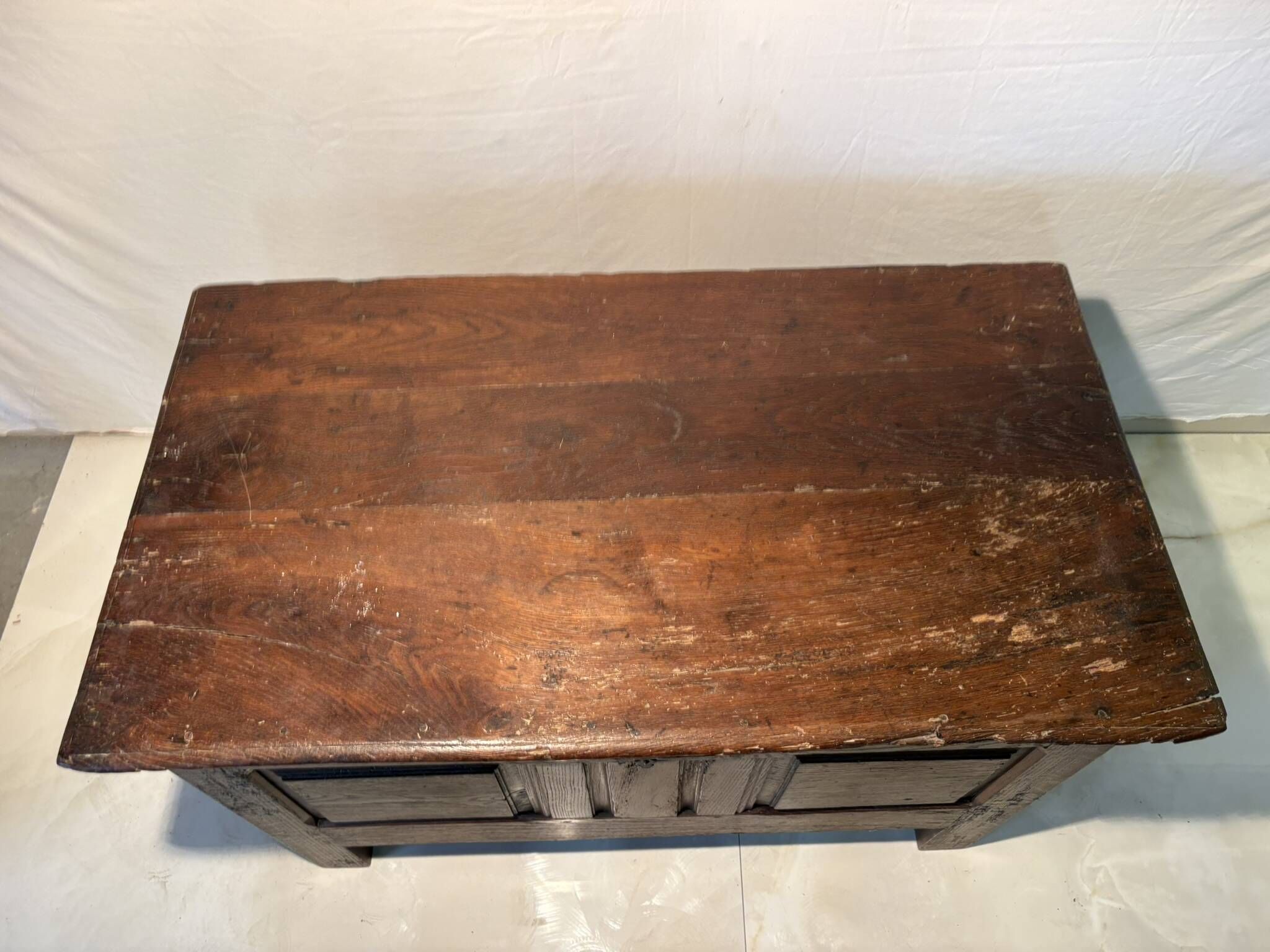 Rustic antique oak chest, original fittings and moulded panels.
