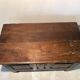 Antique rustic oak chest with original hardware and molded panels