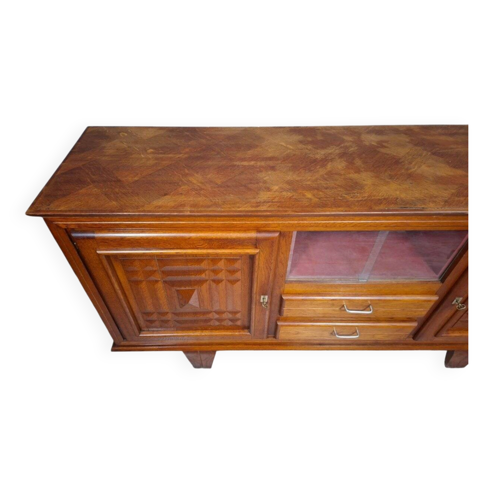 Low buffet in carved oak, Art Deco style, circa 1930.
