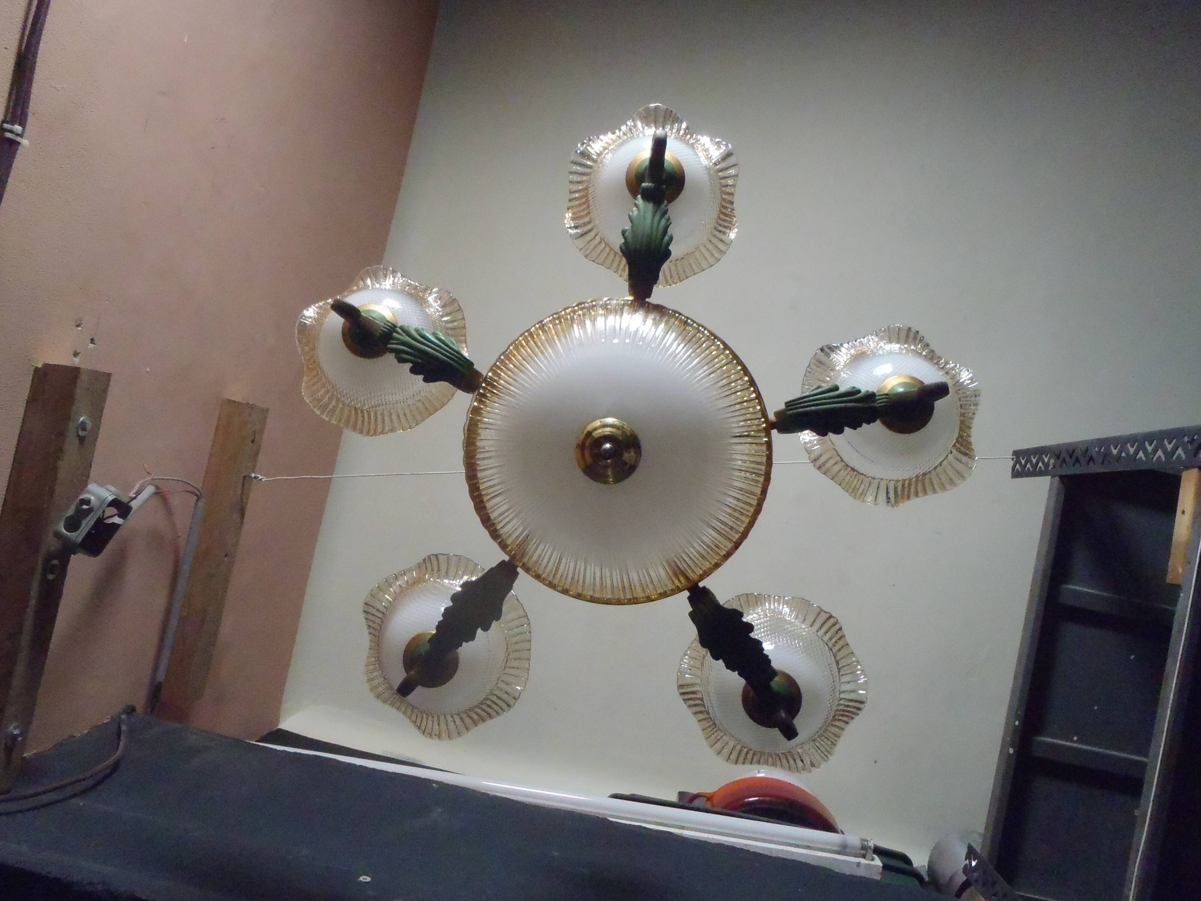 7-light chandelier in glass and brass.