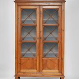 Blond wood cabinet with glass doors, 1970s.