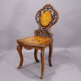 Pair of walnut chairs with Edelweiss marquetry, Brienz Switzerland 1900