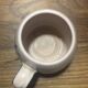 Set of two ceramic mugs signed Yvon ROY.
