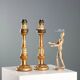 Pair of antique carved and gilded wooden candlesticks, Italy, 19th century.