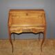 Louis XV donkey back desk in 18th century walnut